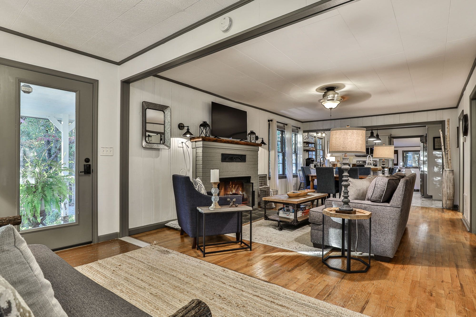 A living room with a fireplace and couch